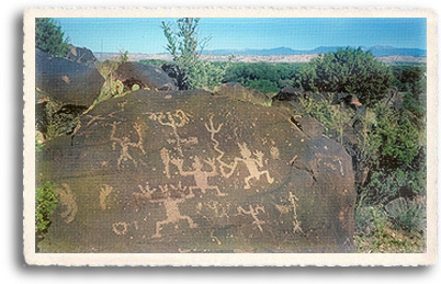 Petroglyphs are Indian rock art. Here we see an exellent example of petroglyphs on a large boulder near the Rio Grande in New Mexico